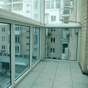 Остекление балкона от фирмы окна реал